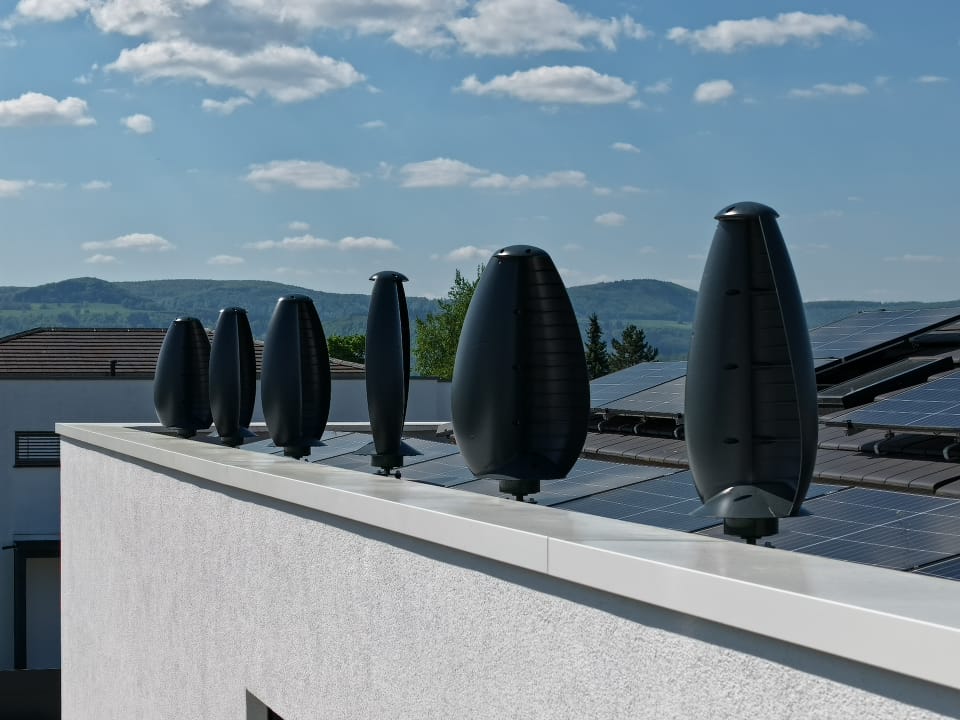Aeroleaf micro-wind system installed on a rooftop in an urban environment