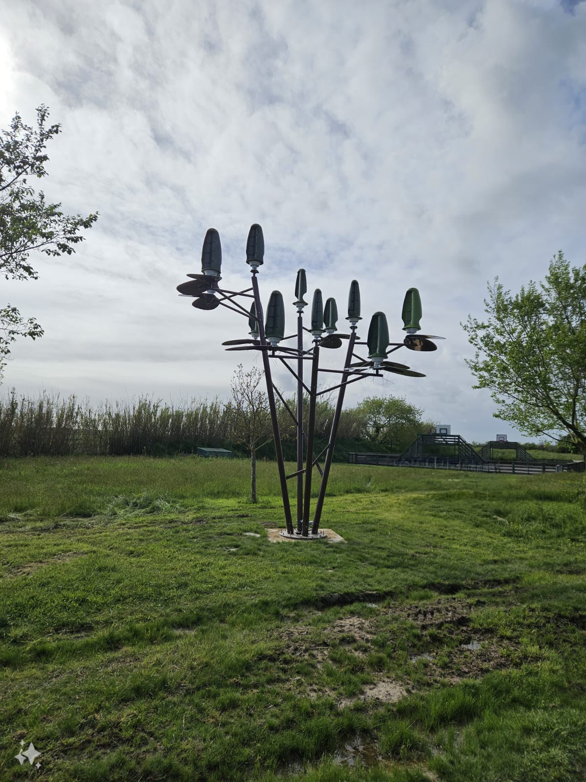 Velox hybrid energy installation with rooftop micro-wind units and solar panels